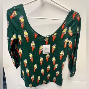 ANTHROPOLOGIE DARK GREEN BIRD PATTERN TOP. SIZE SMALL WITH SCOOP NECKLINE. NWT